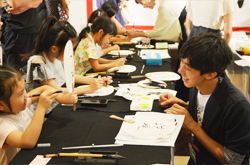 玉川タカシマヤ夏休みイベント「書道パフォーマンス＆うちわ美文字体験」